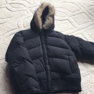 Black puffy coat with fur hood